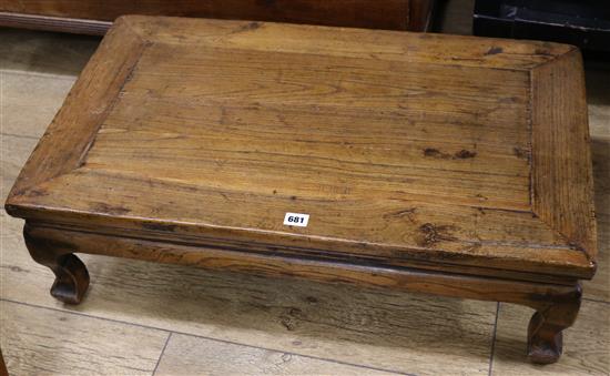A Chinese elm low table L.81cm